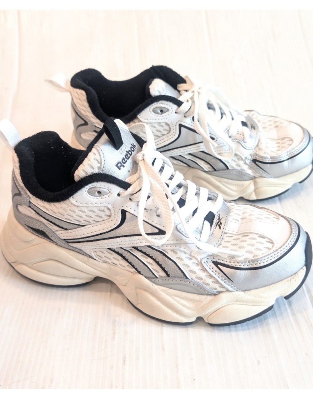 Reebok Women’s White and Black Mesh Running Sneakers charge